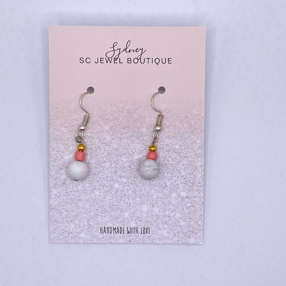 Handmade dangly pink and marble bead earrings